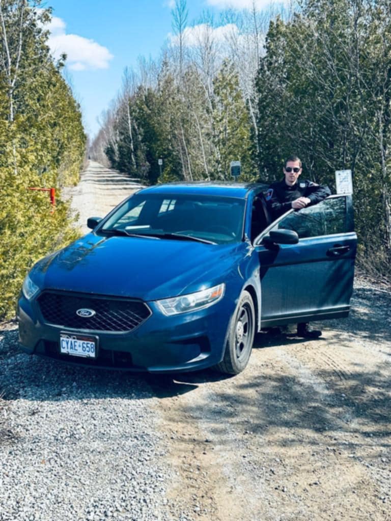 Municipal patrol vehicle on a rural road in Grey-Bruce